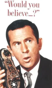Maxwell Smart holding a shoe phone with the phrase 'Would you believe...?' from the 1960s sitcom Get Smart.